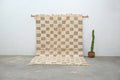 Handmade beige & taupe checkered beni ouarain rug living room decor