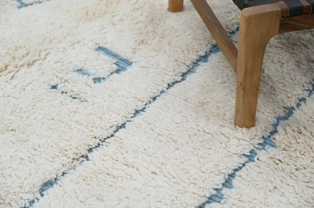 Handmade beni ouarain cream & blue rug bedroom moroccan wool decor