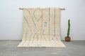Handmade beni ouarain cream & blue rug bedroom moroccan wool decor