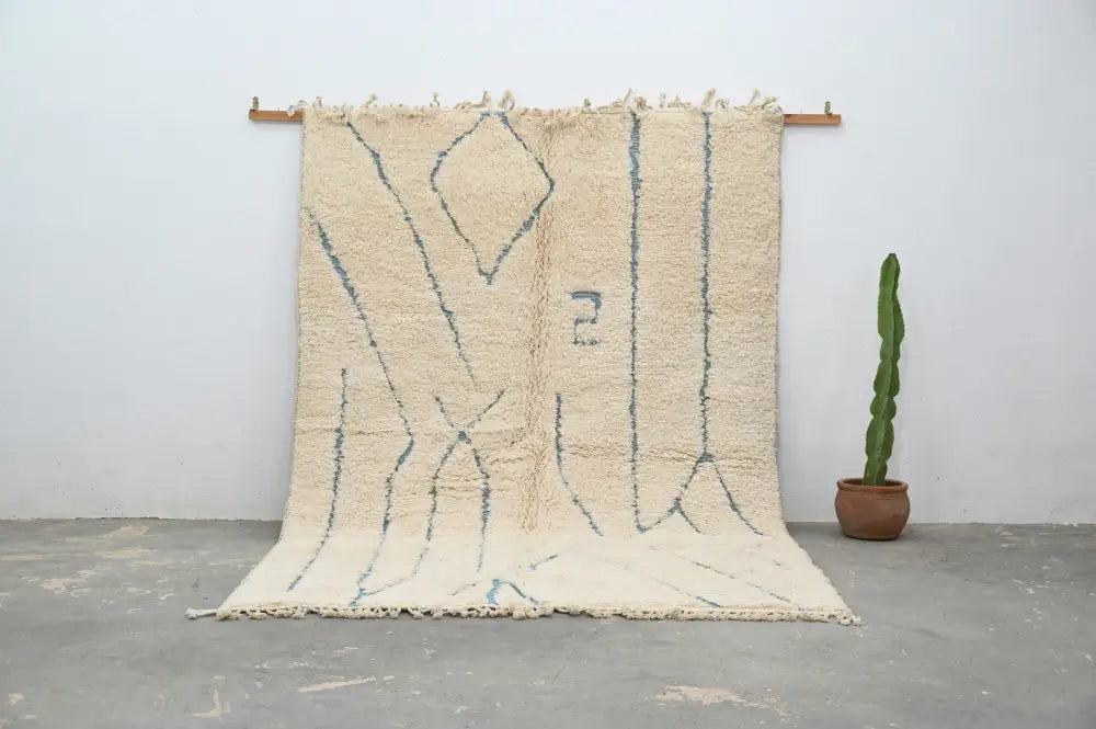 Handmade beni ouarain cream & blue rug bedroom moroccan wool decor