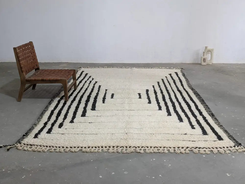 Handmade cream and black beni ouarain rug living room decor