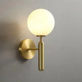 Luxury gold frosted glass globe wall sconce bedroom light