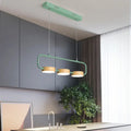 Modern mint green hanging pendant with wood accents for kitchen island