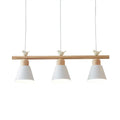 Minimalist wood and white bird hanging island light dining room