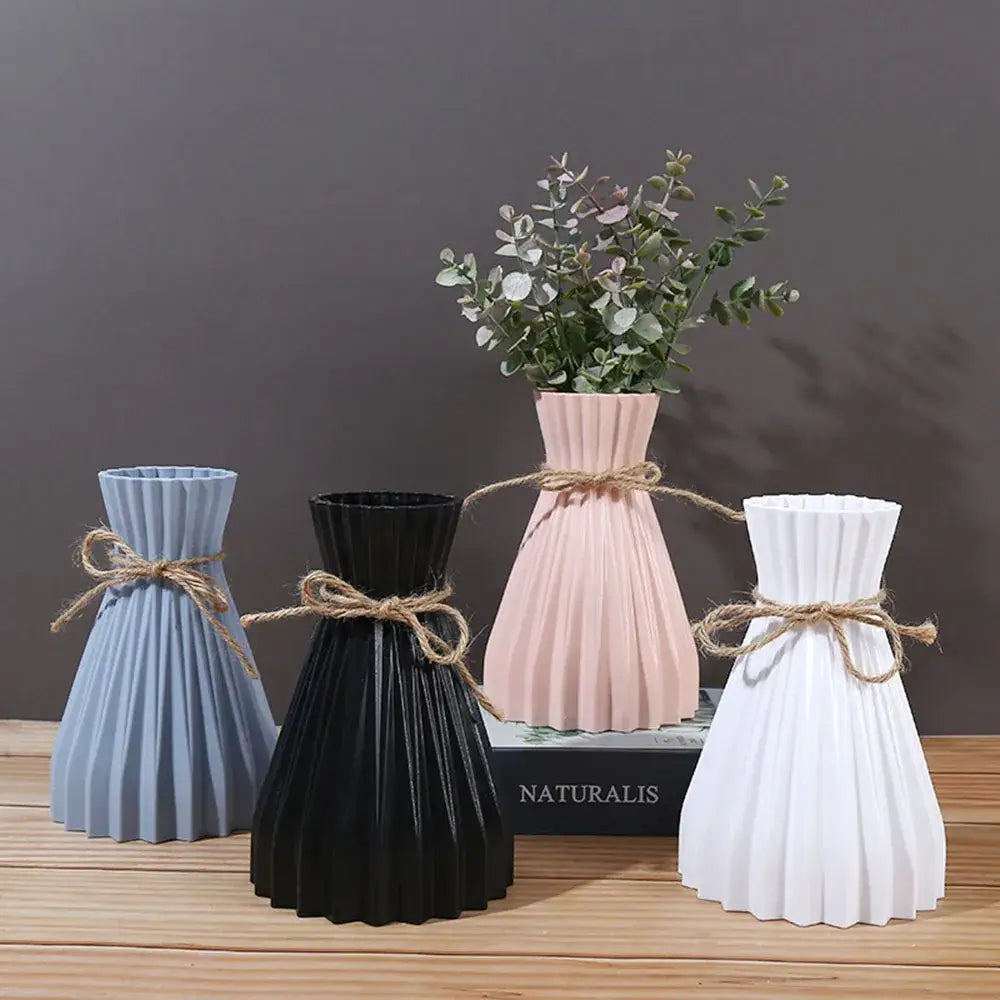 Origami style pink blue and white plastic flower vase living room