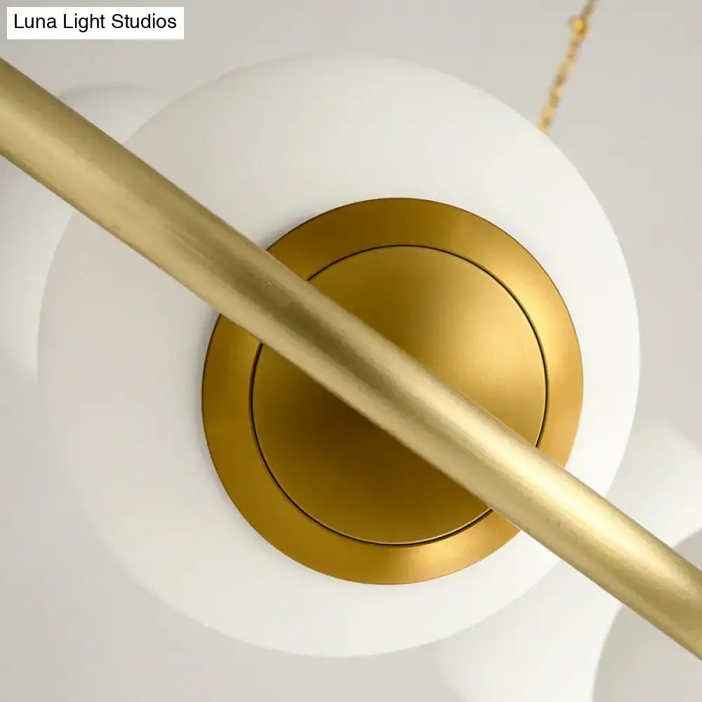 Postmodern brass circular chandelier with frosted glass dining room