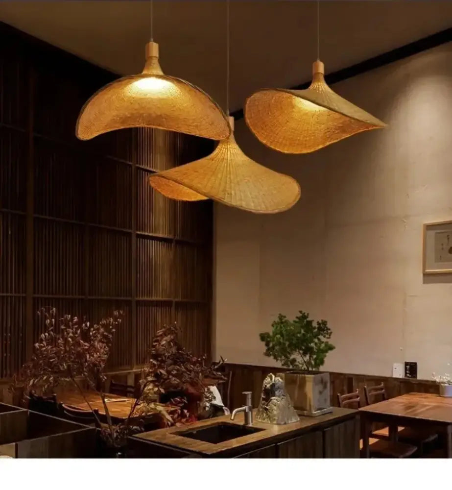 Woven golden brown rattan pendant light with dimmable bamboo shade dining room
