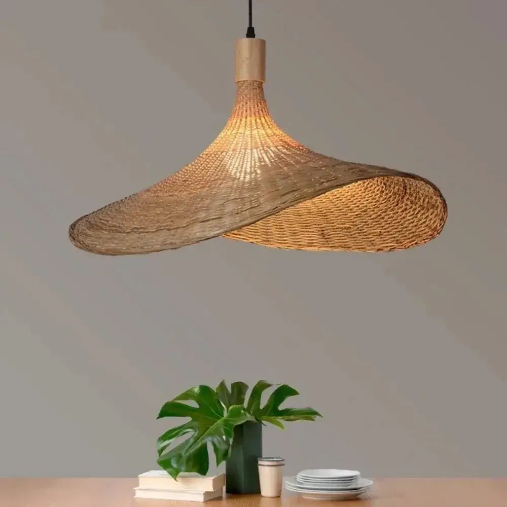 Woven golden brown rattan pendant light with dimmable bamboo shade dining room