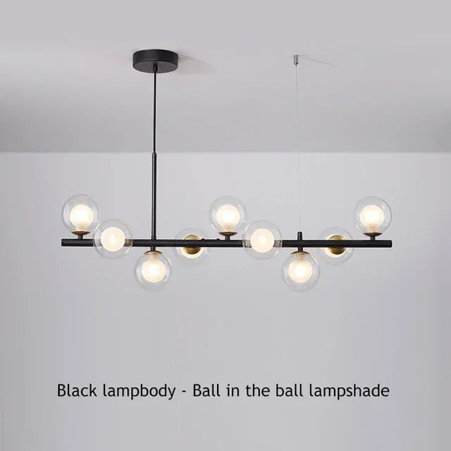 Sleek black metal glass ball chandelier for dining room
