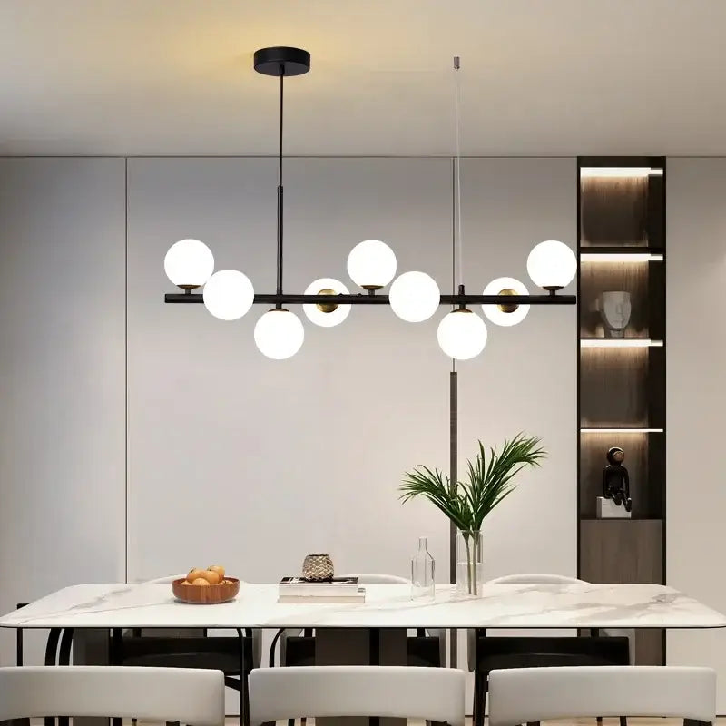 Sleek black metal glass ball chandelier for dining room