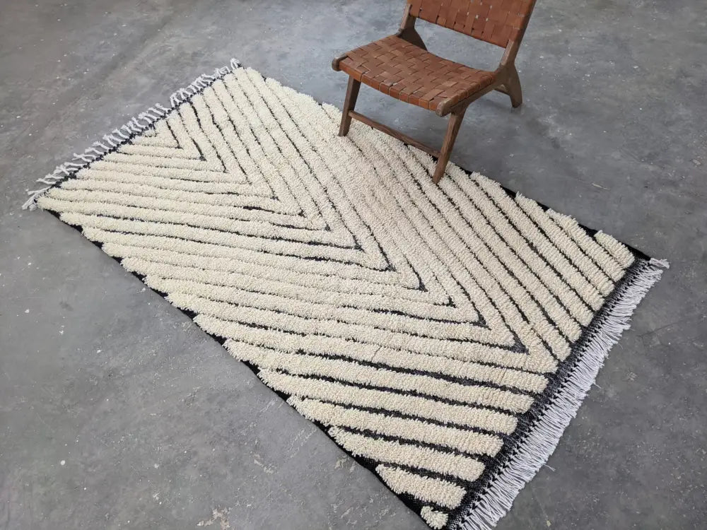 Traditional beni ouarain cream & black wool rug living room