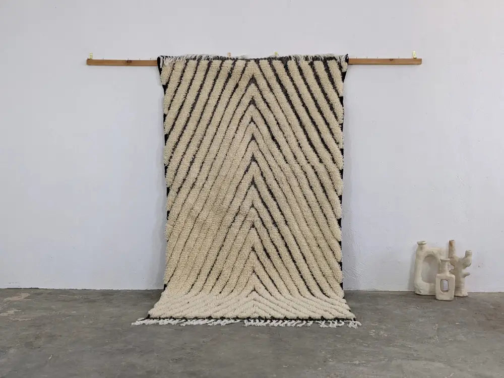 Traditional beni ouarain cream & black wool rug living room