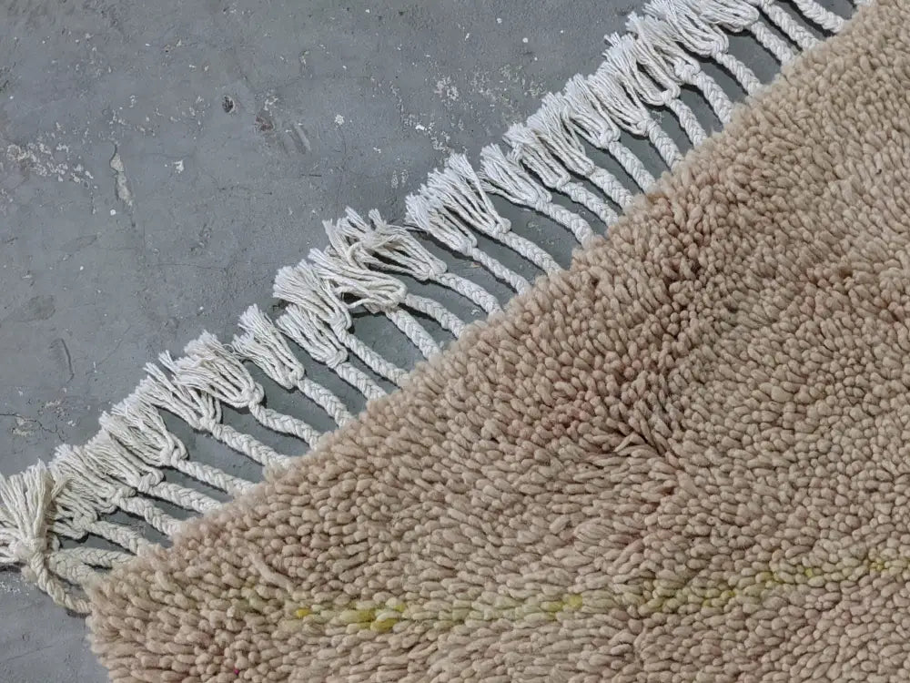 Plush beige beni ouarain wool rug bedroom fringed carpet