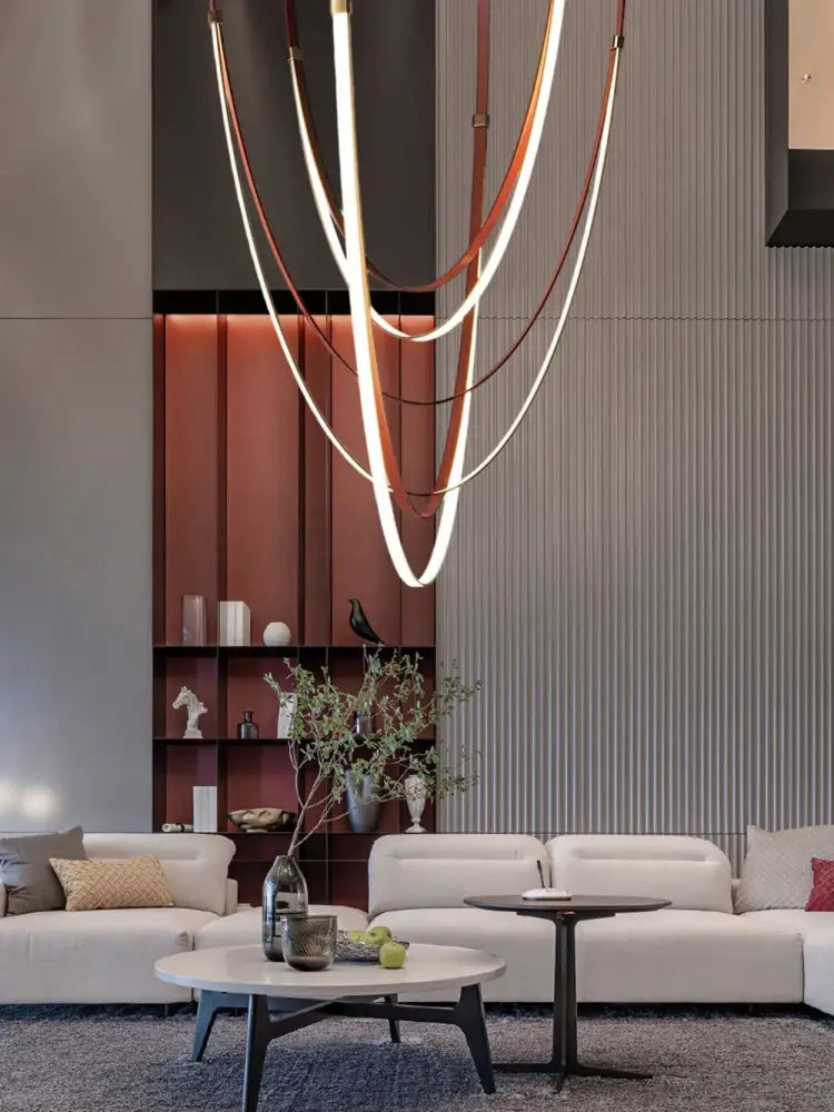 Minimalist silver flexible leather belt wall lamp bedroom light