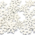 Intricate white wooden snowflake slices for living room christmas crafts