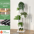 Rustic wood and black metal tiered plant stand living room shelf
