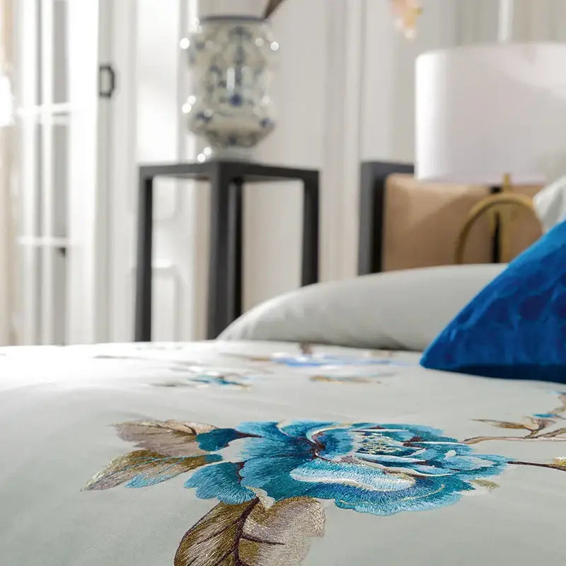 Elegant ivory & royal blue 200s embroidery egyptian cotton bedding set