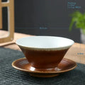 Handcrafted brown & amber ceramic latte coffee cup and saucer dining room