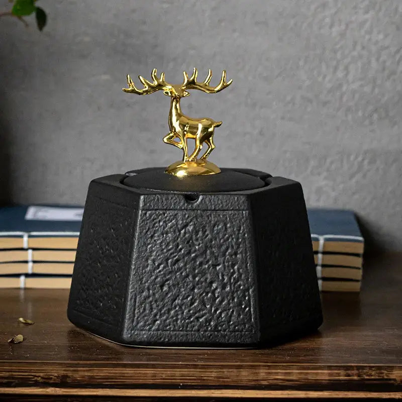 Hexagonal black pottery ashtray with gold deer lid for living room