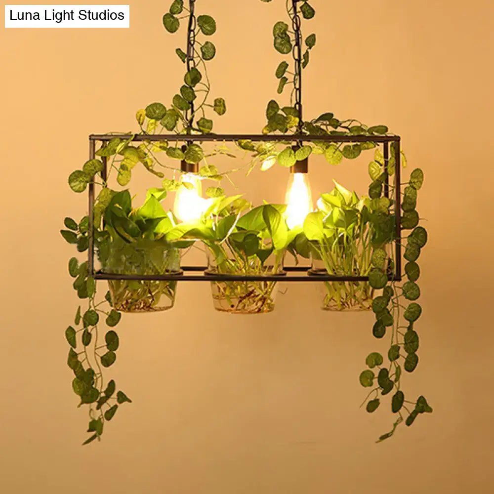 Industrial black island pendant light with potted plant dining room