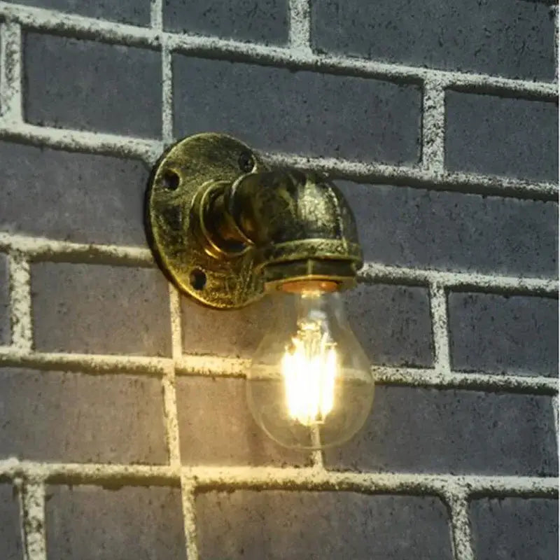Industrial iron pipe wall sconce bedroom brass filament light