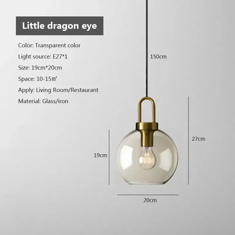 Industrial smoked glass and brass pendant light – dining room
