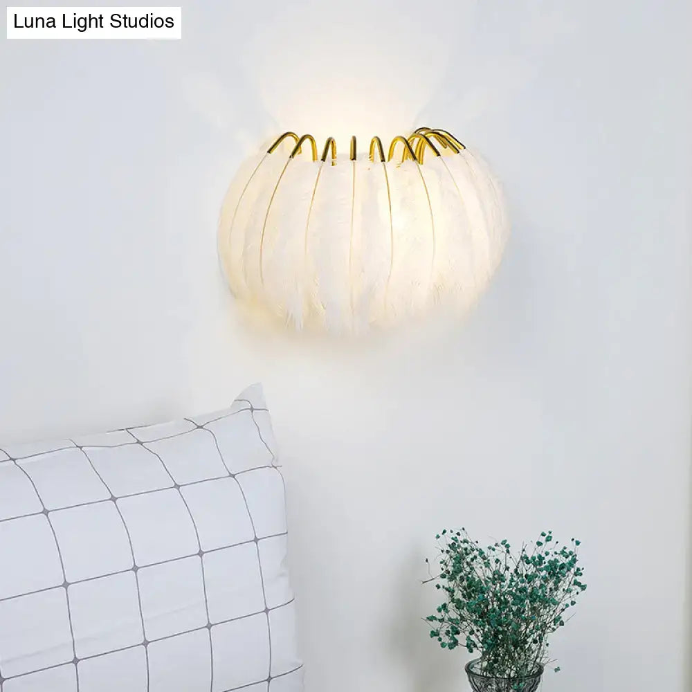 Minimalist black and gold feather wall sconce bedroom light type