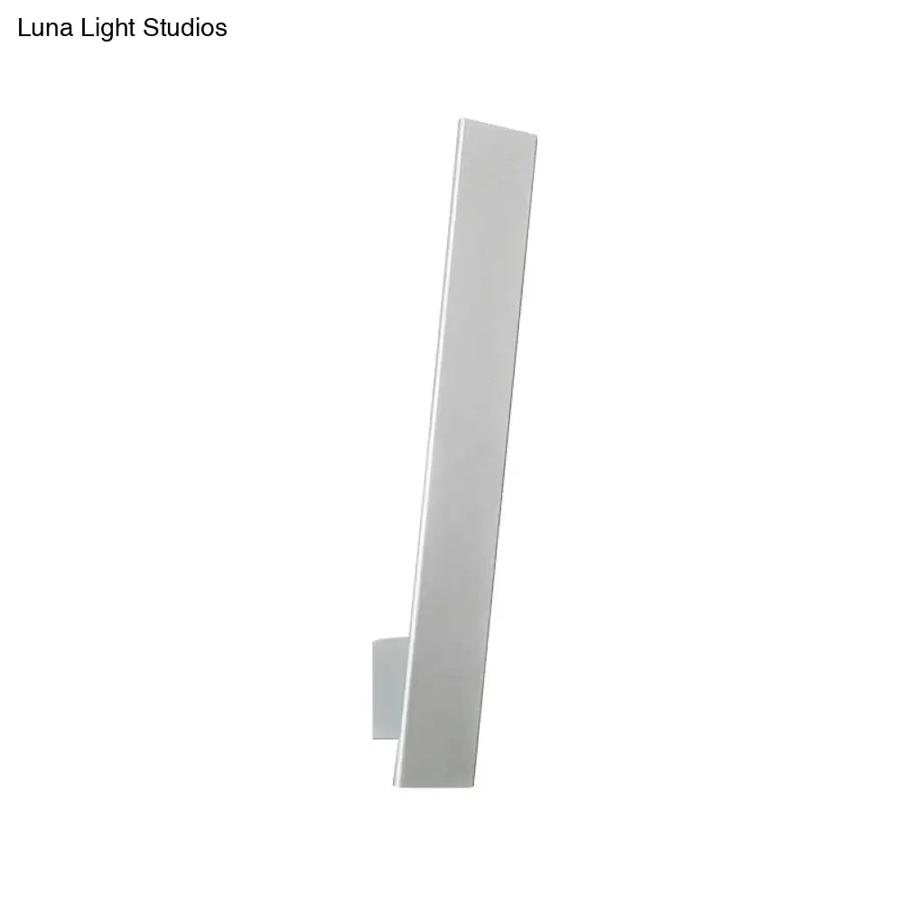 Minimalist black & white aluminum shade direct wired sconce bedroom
