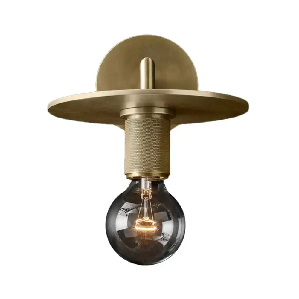 Minimalist bronze wall sconce with glass shade bedroom light