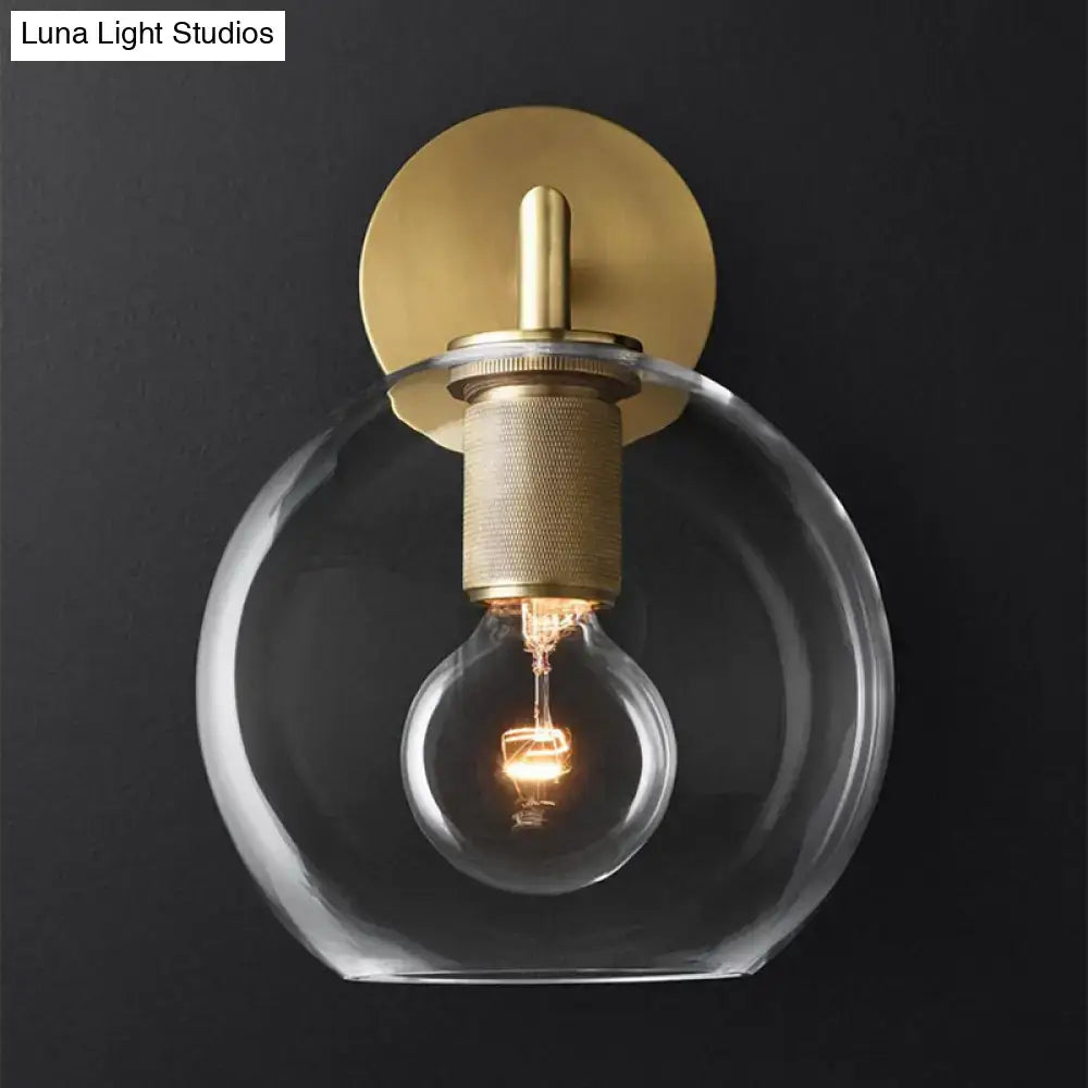Minimalist bronze wall sconce with glass shade bedroom light