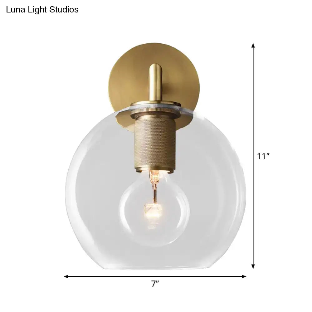 Minimalist bronze wall sconce with glass shade bedroom light