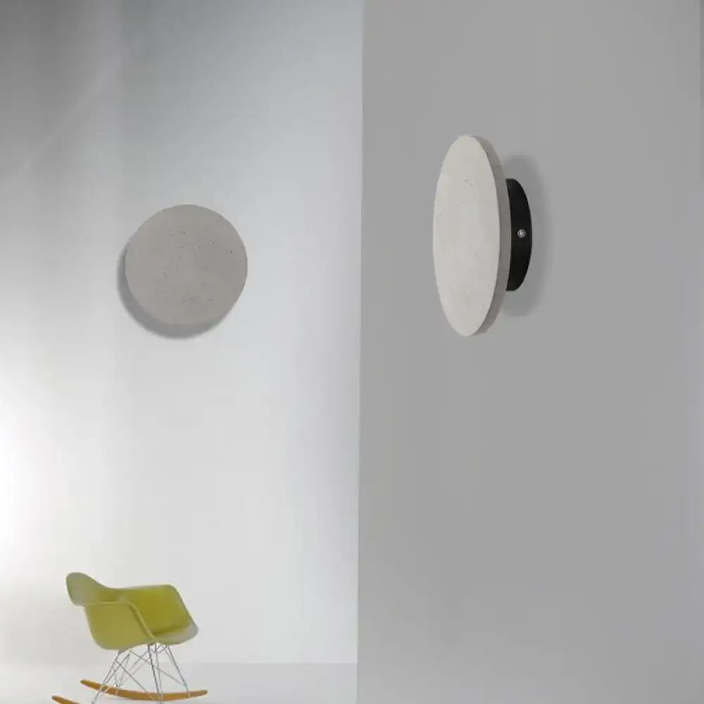 Minimalist cement grey flat round wall sconce light for bedroom