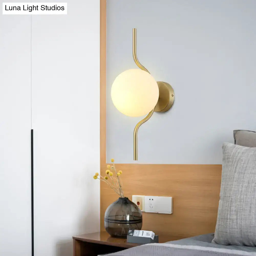 Minimalist gold wall light with white globe shade – bedroom sconce light
