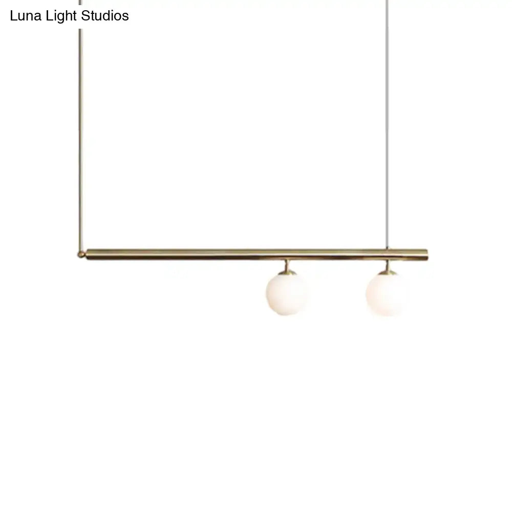 Minimalist golden glass sphere pendant light dining room