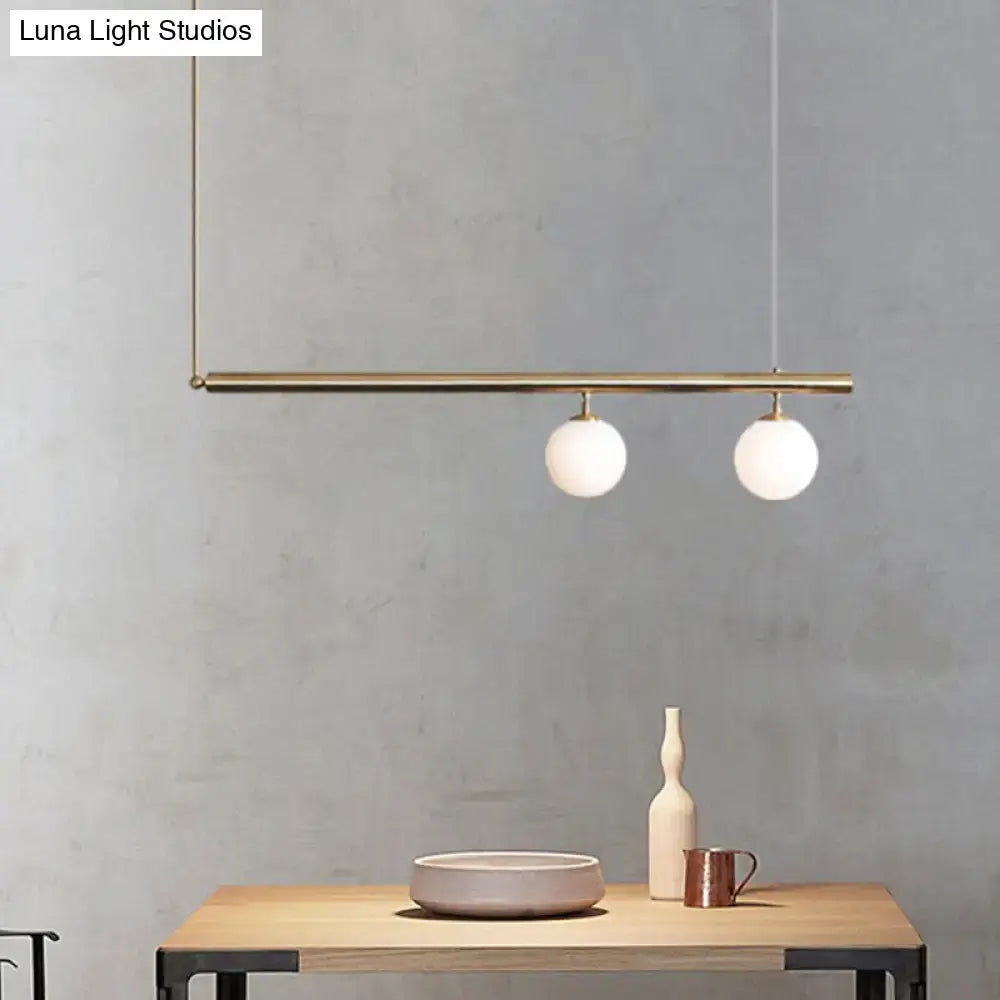 Minimalist golden glass sphere pendant light dining room
