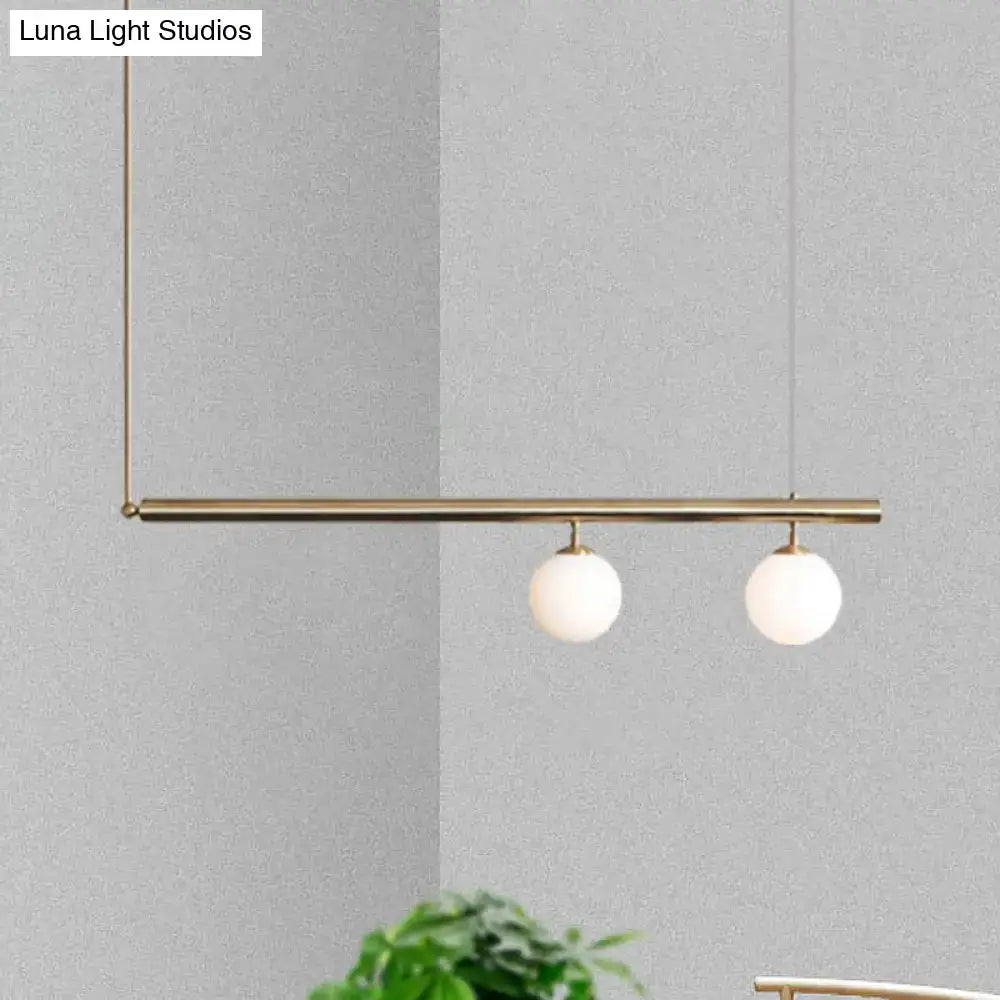 Minimalist golden glass sphere pendant light dining room