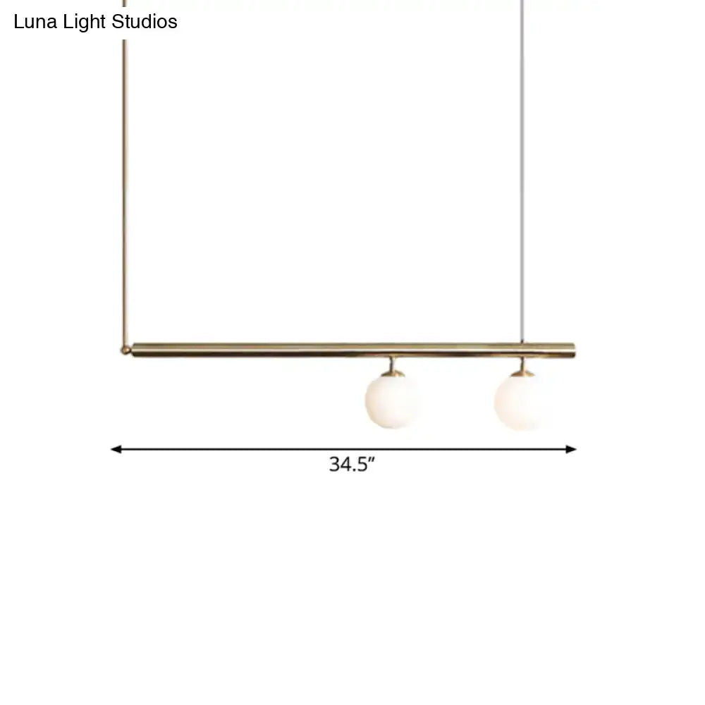 Minimalist golden glass sphere pendant light dining room