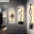 Minimalist line art sconce light fixture – hallway black metal lamp