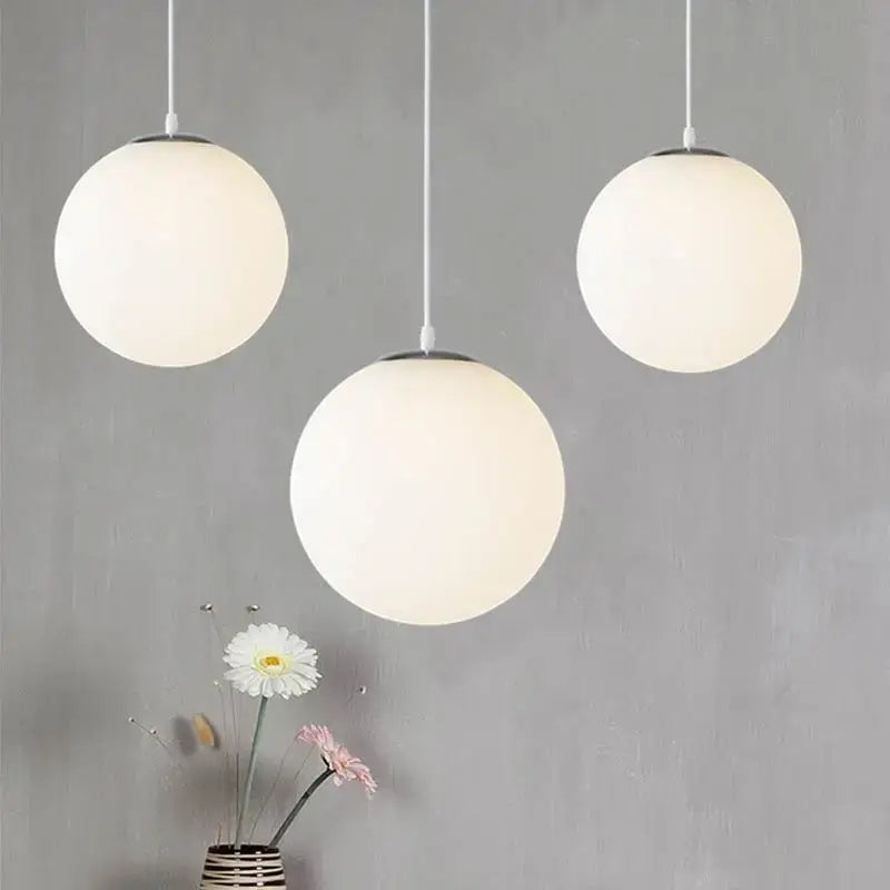 Minimalist white glass ball pendant lights for dining room