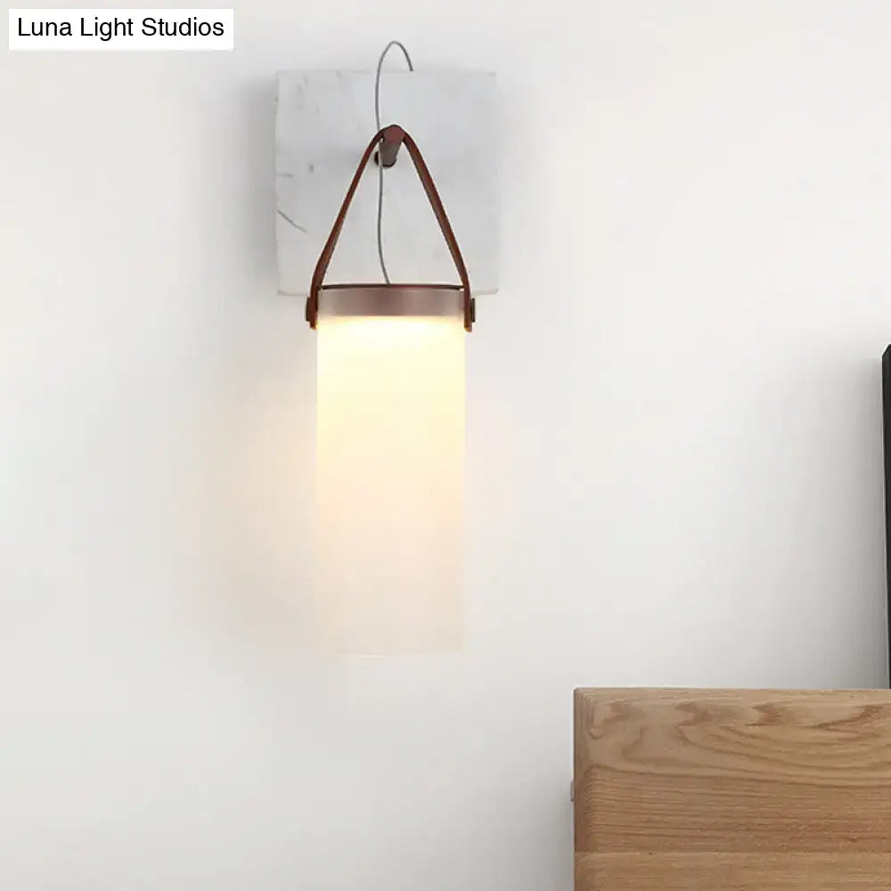 Minimalist white glass wall light with leather strap for bedroom