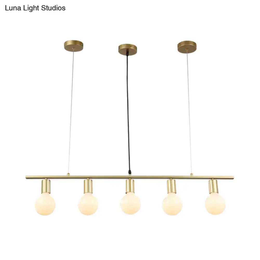 Minimalist white & gold linear metal island lighting dining room