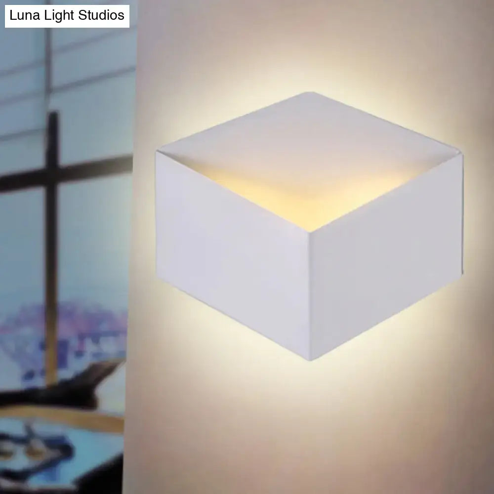 Minimalist white metallic geometric wall mount light for corridor