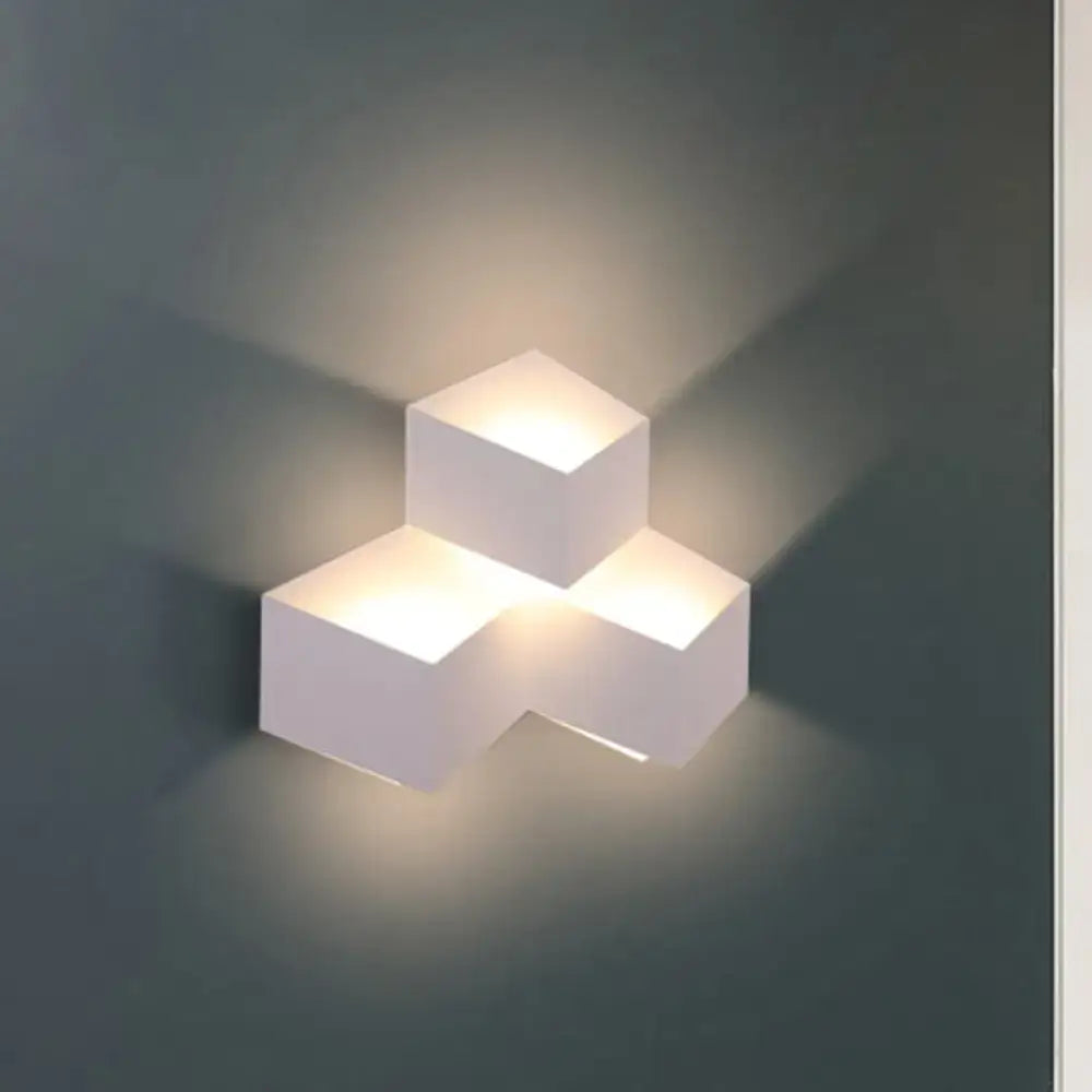 Minimalist white metallic geometric wall mount light for corridor
