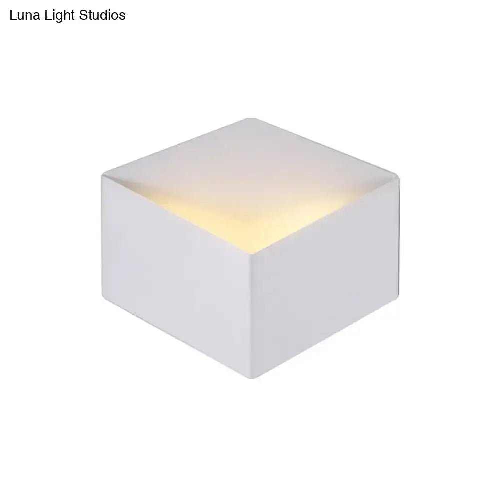 Minimalist white metallic geometric wall mount light for corridor