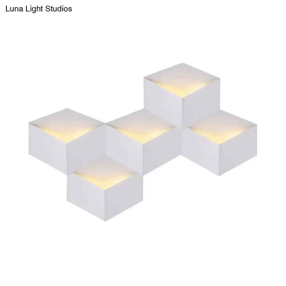 Minimalist white metallic geometric wall mount light for corridor