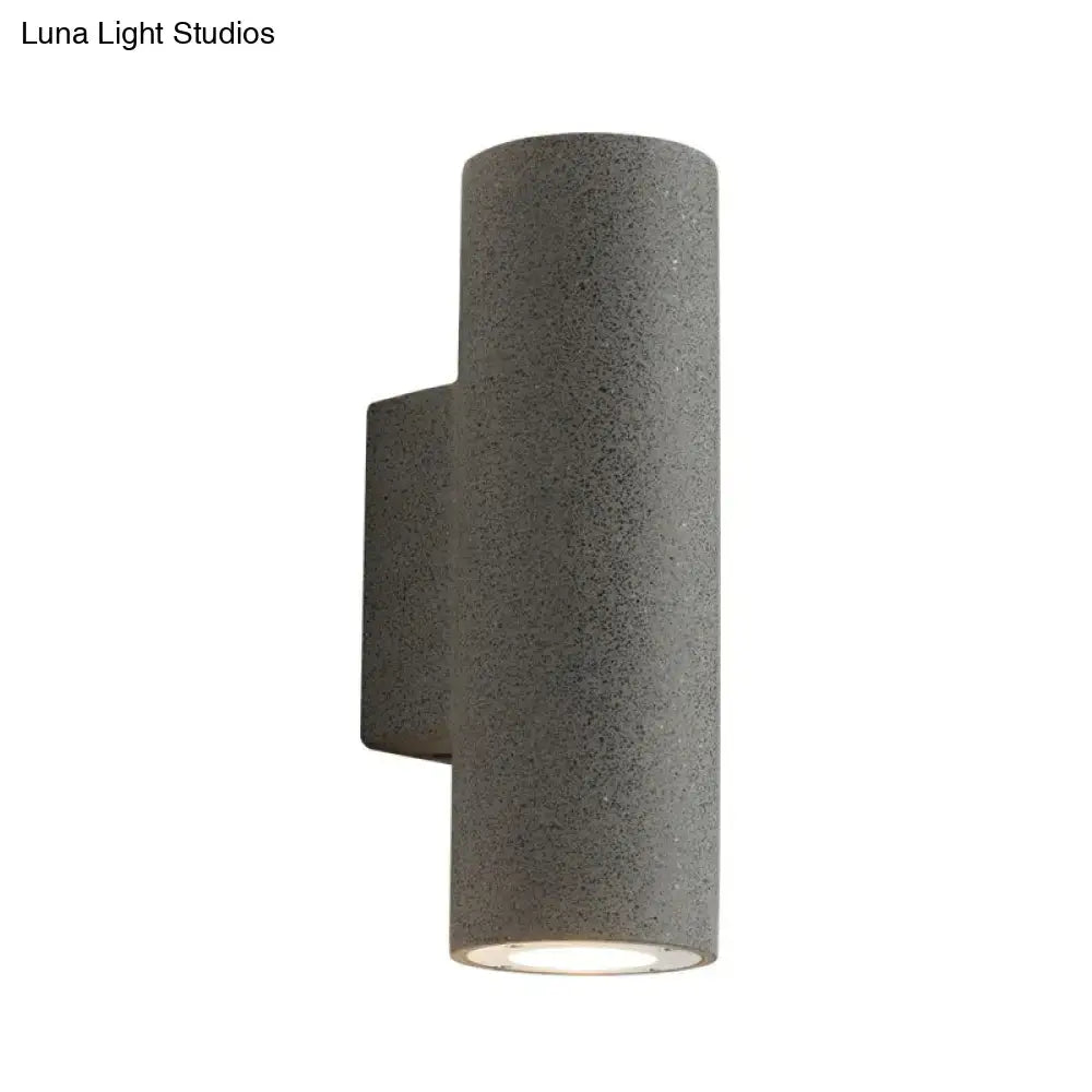Minimalist white terrazzo stair wall sconce with compact fixture height