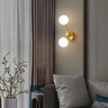 Minimalistic brass branch wall light with frosted glass for bedroom