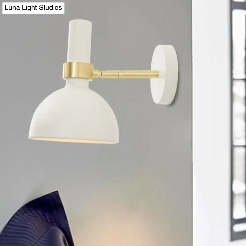 Modern black and brass domed wall lamp for bedroom bedside