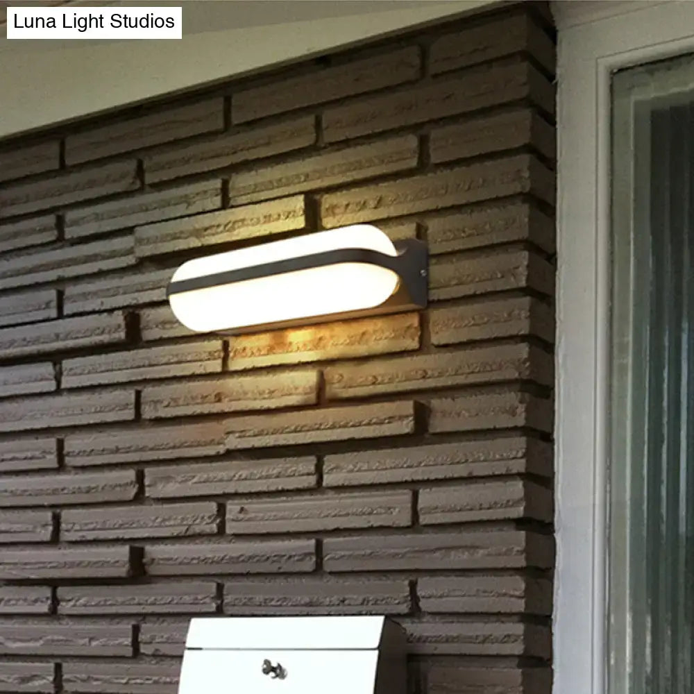 DecorBites™ Modern Black Acrylic Wall Sconce with Flush Capsule Design and Half-Bulb Mounting