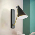 Modern black cone shade wall sconce with brass arm – bedroom light